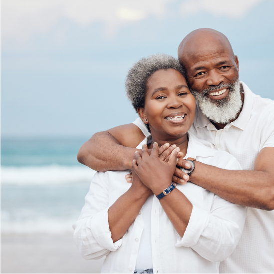 elderly couple on a beach